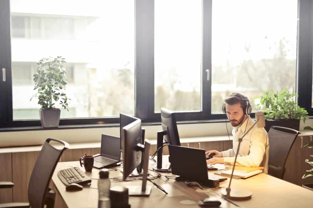 man answering customer support issues