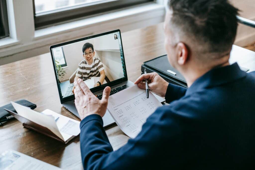two men in a webinar
